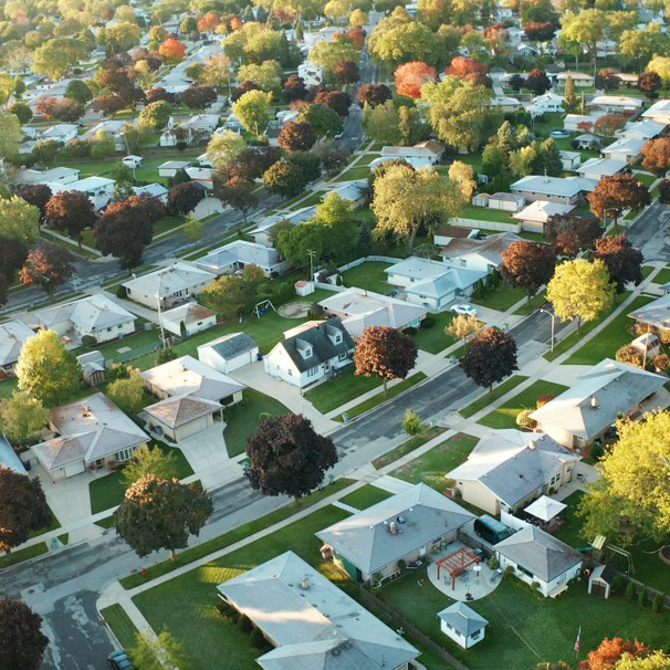 Aerial view of a residential neighborhood, representing community development supported by New Omni Bank.