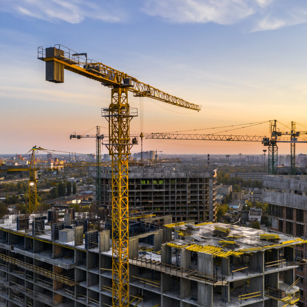 A new dawn at a construction site, symbolizing growth and development powered by New Omni Bank's Construction Loan.