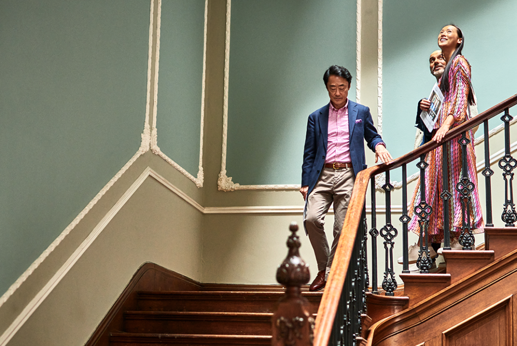 Diverse couple viewing a potential new home, symbolizing tailored mortgage solutions for international buyers and new immigrants.
